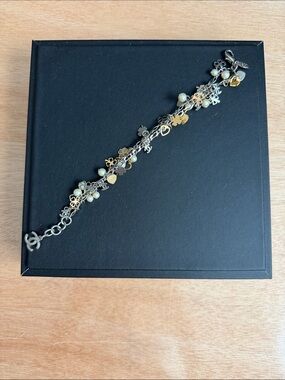 CHANEL Vintage Authentic Two-Tone Floral Charm Bracelet with Cream Beads